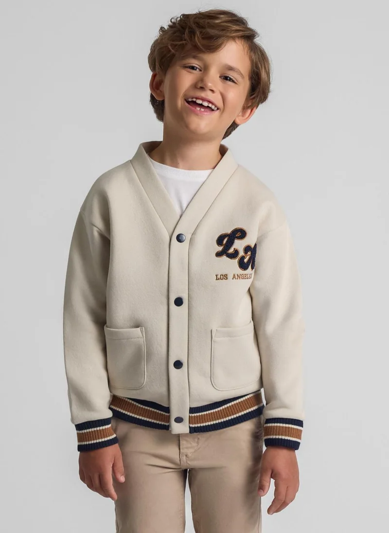 مينوتي سويت شيرت بستايل جامعي للأولاد بطباعة وجيوب أمامية